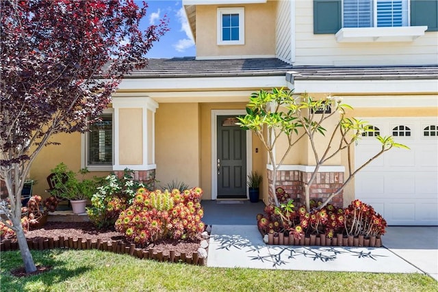 35694 Cherry Bark Way, Murrieta, CA 92562 - doorway to property with stucco siding, concrete driveway, and an attached garage