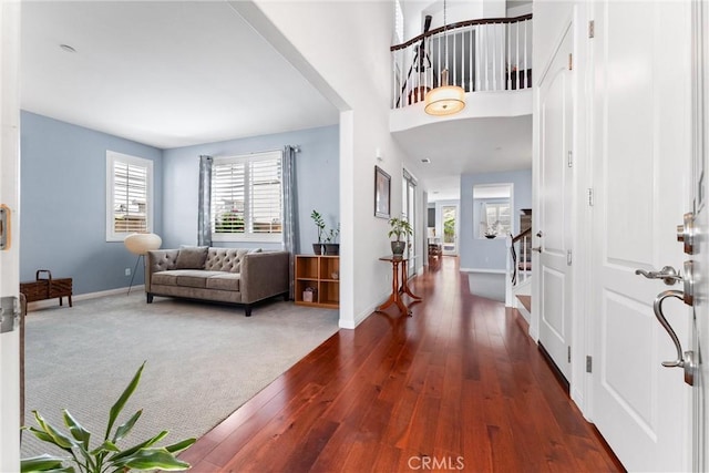 35694 Cherry Bark Way, Murrieta, CA 92562 - entrance foyer with healthy amount of natural light, dark wood-style floors, and stairway