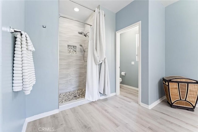 35694 Cherry Bark Way, Murrieta, CA 92562 - full bath featuring a tile shower, wood finished floors, and recessed lighting