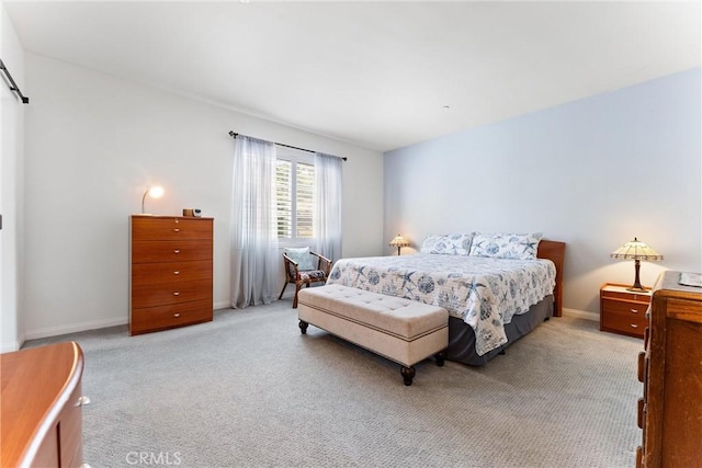 35694 Cherry Bark Way, Murrieta, CA 92562 - bedroom with light colored carpet and a barn door