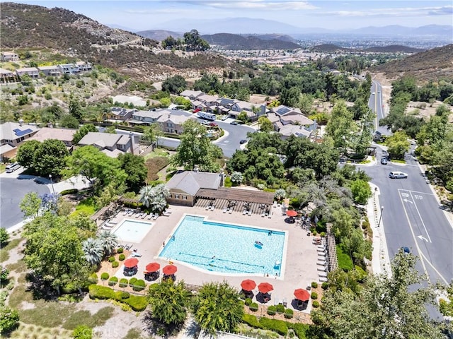 35694 Cherry Bark Way, Murrieta, CA 92562 - drone / aerial view of a pool area and a mountainous background