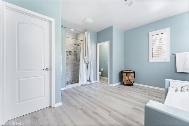 35694 Cherry Bark Way, Murrieta, CA 92562 - full bathroom with a shower stall, wood finished floors, and a tub to relax in
