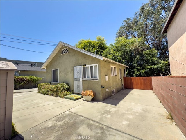 3621 Griffin Ave, Los Angeles, CA 90031 - view of property exterior featuring a patio and stucco siding