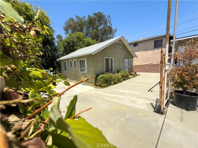 3621 Griffin Ave, Los Angeles, CA 90031 - back of house with stucco siding and a patio