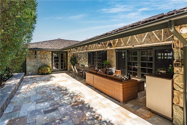 1251 Bryant Rd, Long Beach, CA 90815 - view of patio featuring french doors and an outdoor hangout area