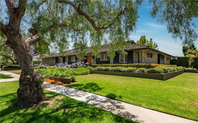 1251 Bryant Rd, Long Beach, CA 90815 - ranch-style house with stone siding and a front lawn