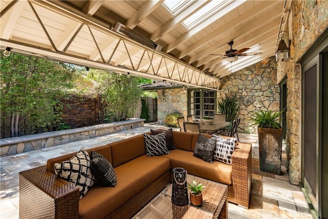 1251 Bryant Rd, Long Beach, CA 90815 - fenced backyard with an outdoor living space, outdoor dining area, ceiling fan, and a patio