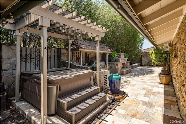 1251 Bryant Rd, Long Beach, CA 90815 - fenced backyard featuring a hot tub, a patio area, a pergola, and grilling area