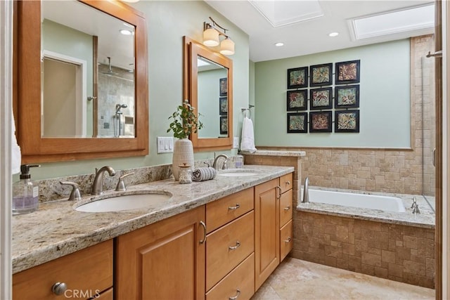1251 Bryant Rd, Long Beach, CA 90815 - bathroom with a garden tub, double vanity, tiled shower, tile patterned floors, and recessed lighting