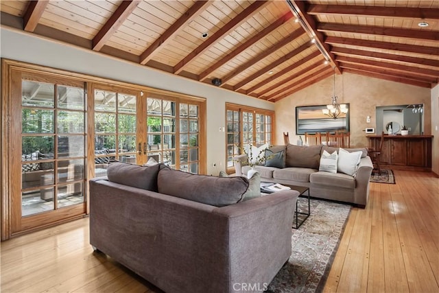 1251 Bryant Rd, Long Beach, CA 90815 - living area with french doors, wood ceiling, light wood-style floors, and a chandelier