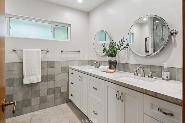 1251 Bryant Rd, Long Beach, CA 90815 - full bath featuring double vanity, tile walls, tile patterned floors, recessed lighting, and wainscoting