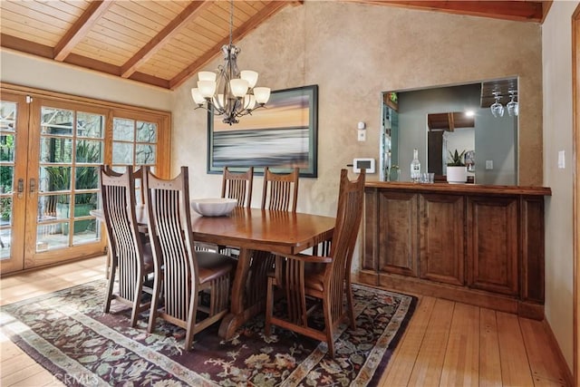 1251 Bryant Rd, Long Beach, CA 90815 - dining room featuring light wood-type flooring, a chandelier, wooden ceiling, and french doors