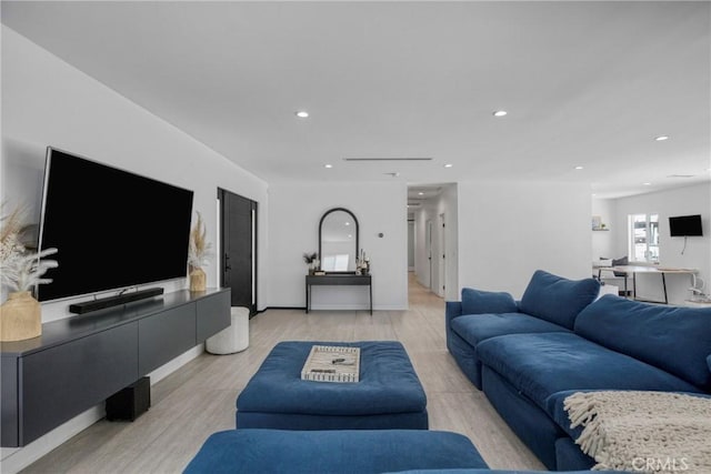 8140 Quartz Ave, Winnetka, CA 91306 - living room with light wood-style floors and recessed lighting