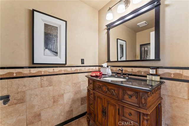 34037 Agua Dulce Canyon Rd, Agua Dulce, CA 91390 - bathroom featuring tile walls, vanity, wainscoting, and tile patterned floors