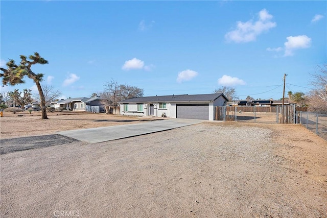 12684 Snapping Turtle Rd, Apple Valley, CA 92308 - ranch-style home featuring concrete driveway, a garage, and a gate