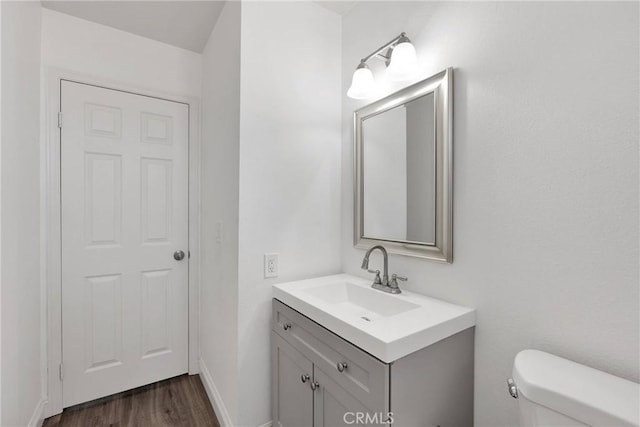 12684 Snapping Turtle Rd, Apple Valley, CA 92308 - half bathroom featuring vanity and wood finished floors
