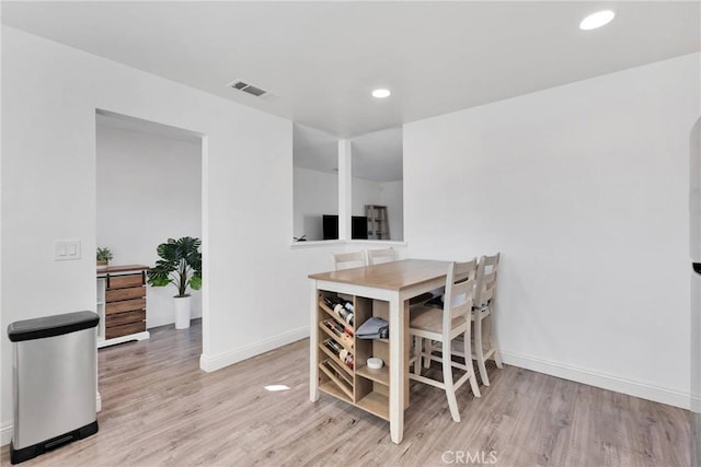 12684 Snapping Turtle Rd, Apple Valley, CA 92308 - dining room with light wood finished floors and recessed lighting