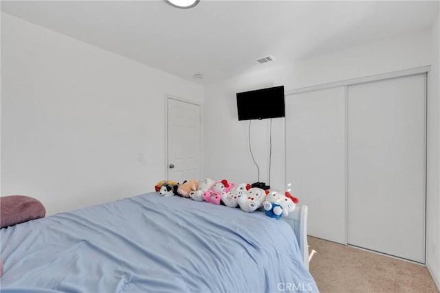 12684 Snapping Turtle Rd, Apple Valley, CA 92308 - bedroom featuring light colored carpet and a closet