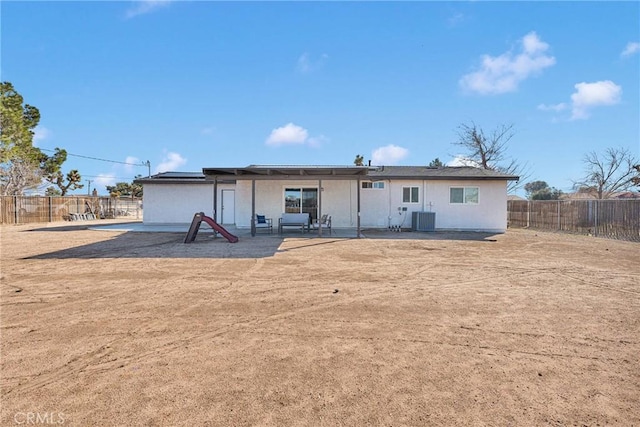 12684 Snapping Turtle Rd, Apple Valley, CA 92308 - back of property featuring a patio area, a fenced backyard, and solar panels