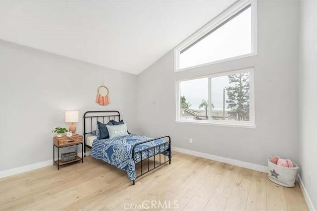 6212 Sacramento Ave, Rancho Cucamonga, CA 91701 - bedroom with wood finished floors and high vaulted ceiling