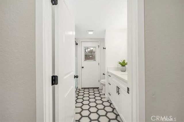6212 Sacramento Ave, Rancho Cucamonga, CA 91701 - bathroom with a textured wall and vanity