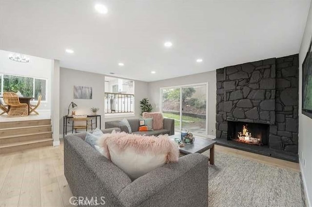 6212 Sacramento Ave, Rancho Cucamonga, CA 91701 - living area with light wood-type flooring, a fireplace, and recessed lighting