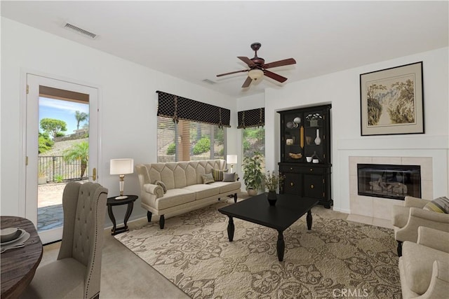 24038 Watercress Dr, Corona, CA 92883 - living area featuring ceiling fan and a tiled fireplace