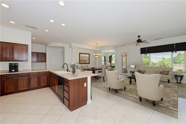 24038 Watercress Dr, Corona, CA 92883 - kitchen featuring a peninsula, light countertops, dishwasher, open floor plan, and ceiling fan