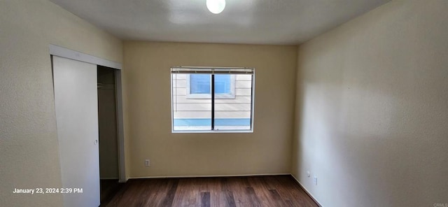3040 Charwood Ct, Spring Valley, CA 91977 - unfurnished bedroom featuring wood finished floors and a closet
