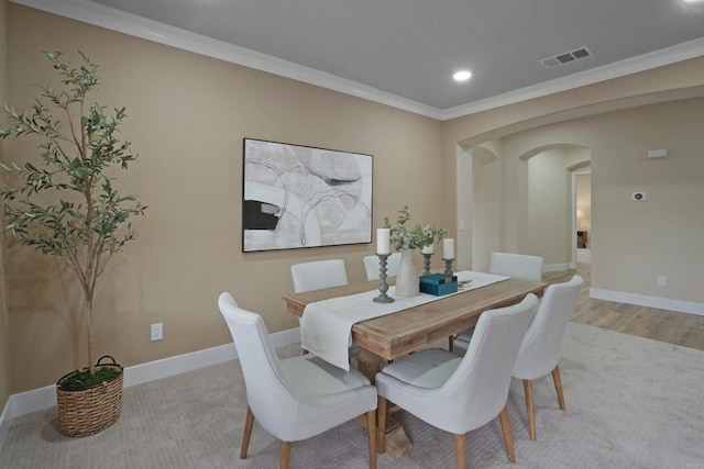 3017 Rue Montreux, Escondido, CA 92026 - dining room with arched walkways, crown molding, recessed lighting, and light wood-style floors
