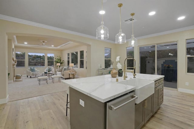 3017 Rue Montreux, Escondido, CA 92026 - kitchen featuring dishwasher, light wood-style floors, a center island with sink, hanging light fixtures, and ceiling fan