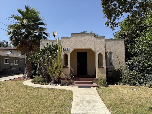 615 E 12th St, Pomona, CA 91766 - mediterranean / spanish-style home with stucco siding