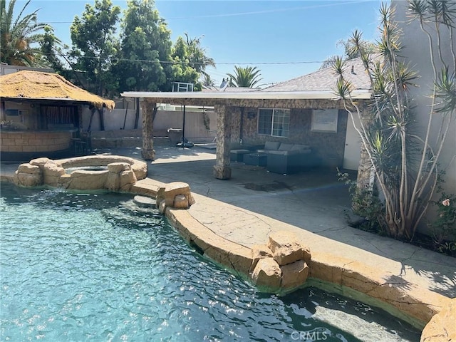 24252 Palmek Cir, Lake Forest, CA 92630 - view of swimming pool featuring a patio area, an outdoor hangout area, a pool with connected hot tub, and a fenced backyard