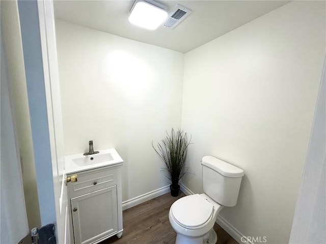 24252 Palmek Cir, Lake Forest, CA 92630 - half bath featuring vanity and wood finished floors
