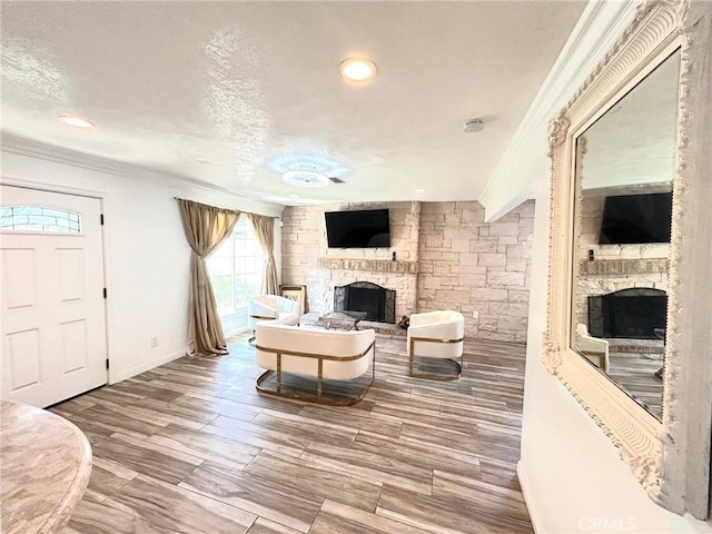 24252 Palmek Cir, Lake Forest, CA 92630 - living room with a fireplace, ornamental molding, recessed lighting, and wood finished floors