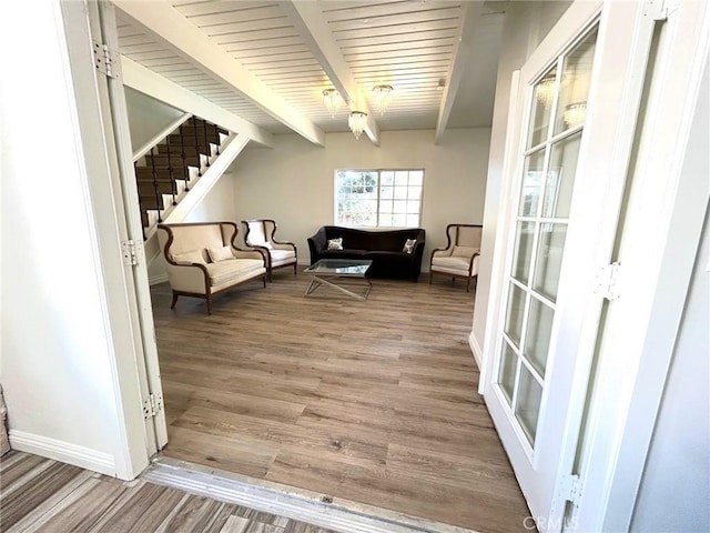 24252 Palmek Cir, Lake Forest, CA 92630 - living area featuring wood finished floors, beam ceiling, and stairs