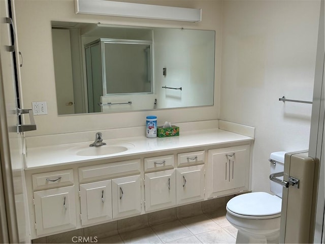 13361 N Fairfield Unit 180J, Seal Beach, CA 90740 - bathroom with vanity, a stall shower, and tile patterned flooring
