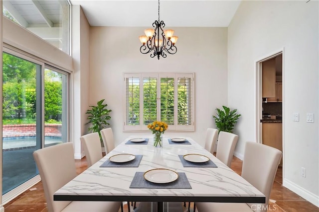 23415 Park Hacienda, Calabasas, CA 91302 - dining area with a chandelier and a towering ceiling
