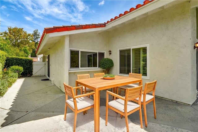 23415 Park Hacienda, Calabasas, CA 91302 - view of patio featuring a gate and outdoor dining area