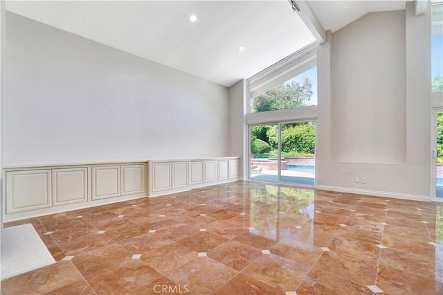 23415 Park Hacienda, Calabasas, CA 91302 - empty room featuring high vaulted ceiling and recessed lighting
