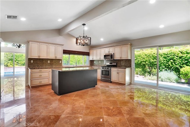 23415 Park Hacienda, Calabasas, CA 91302 - kitchen with stainless steel appliances, cream cabinets, backsplash, a chandelier, and recessed lighting