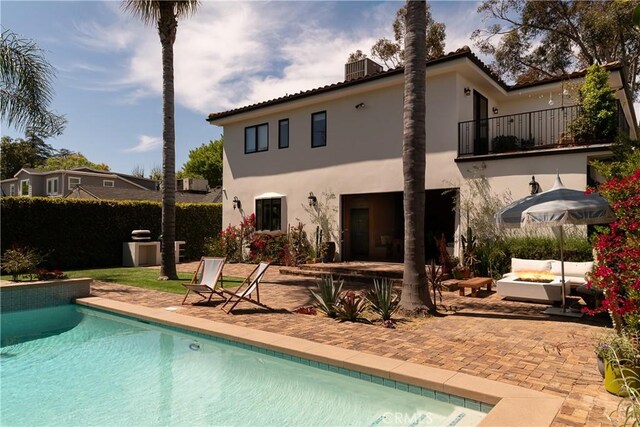 4620 Morse Ave, Sherman Oaks, CA 91423 - back of property featuring a balcony, a patio, stucco siding, and a chimney