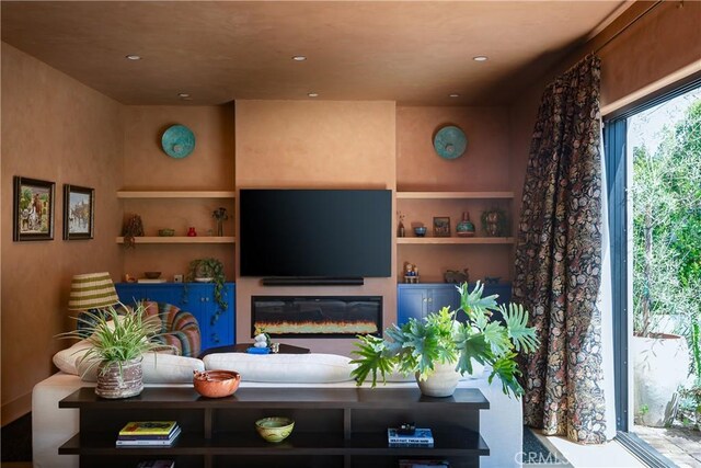 4620 Morse Ave, Sherman Oaks, CA 91423 - living room featuring a glass covered fireplace