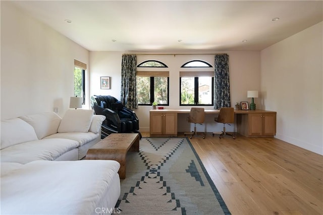 4620 Morse Ave, Sherman Oaks, CA 91423 - living room featuring light wood finished floors and built in desk