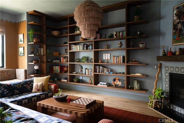 4620 Morse Ave, Sherman Oaks, CA 91423 - living room featuring wood finished floors and a tile fireplace