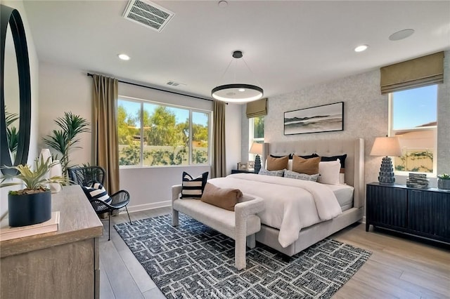 3042 Mesa Gln, Escondido, CA 92026 - bedroom featuring multiple windows, recessed lighting, and light wood finished floors