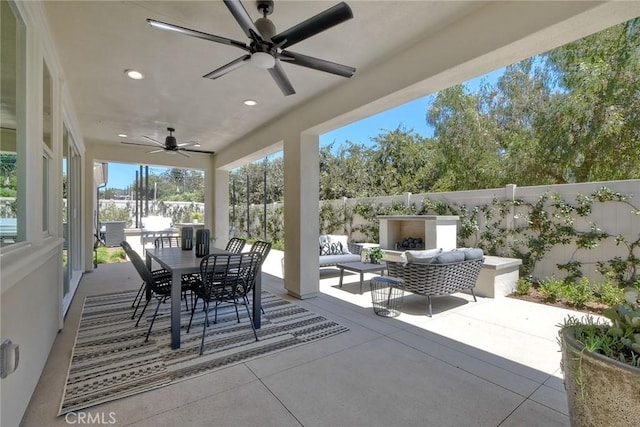 3042 Mesa Gln, Escondido, CA 92026 - fenced backyard featuring ceiling fan, a patio, outdoor lounge area, and outdoor dining area
