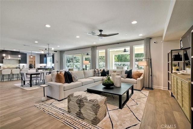 3042 Mesa Gln, Escondido, CA 92026 - living area with ceiling fan, light wood finished floors, and recessed lighting