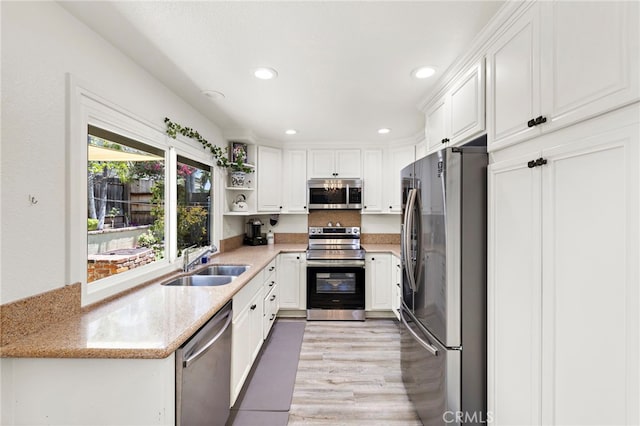 22391 Lombardi, Laguna Hills, CA 92653 - kitchen featuring appliances with stainless steel finishes, white cabinetry, light stone counters, open shelves, and recessed lighting