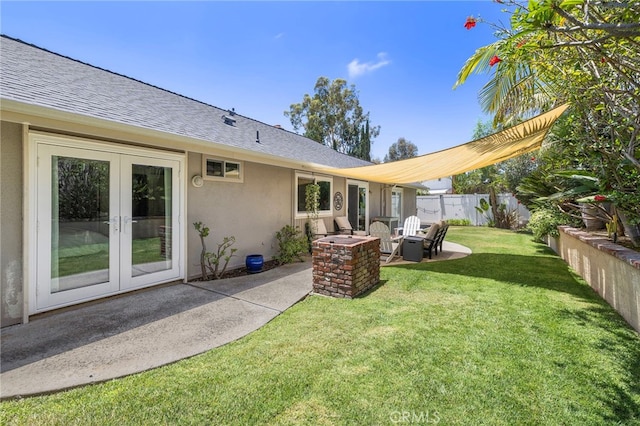 22391 Lombardi, Laguna Hills, CA 92653 - view of yard featuring french doors, a patio, and an outdoor fire pit